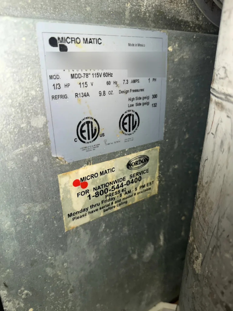 Micro Matic MDD-78 nameplate with the serial number blurred